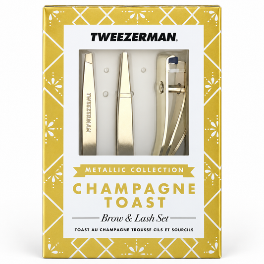 Tweezerman Champagne Toast Brow & Lash Set – Frontansicht, goldfarbene Geschenkverpackung